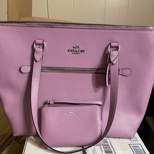 Brand new Coach purse and wristlet
